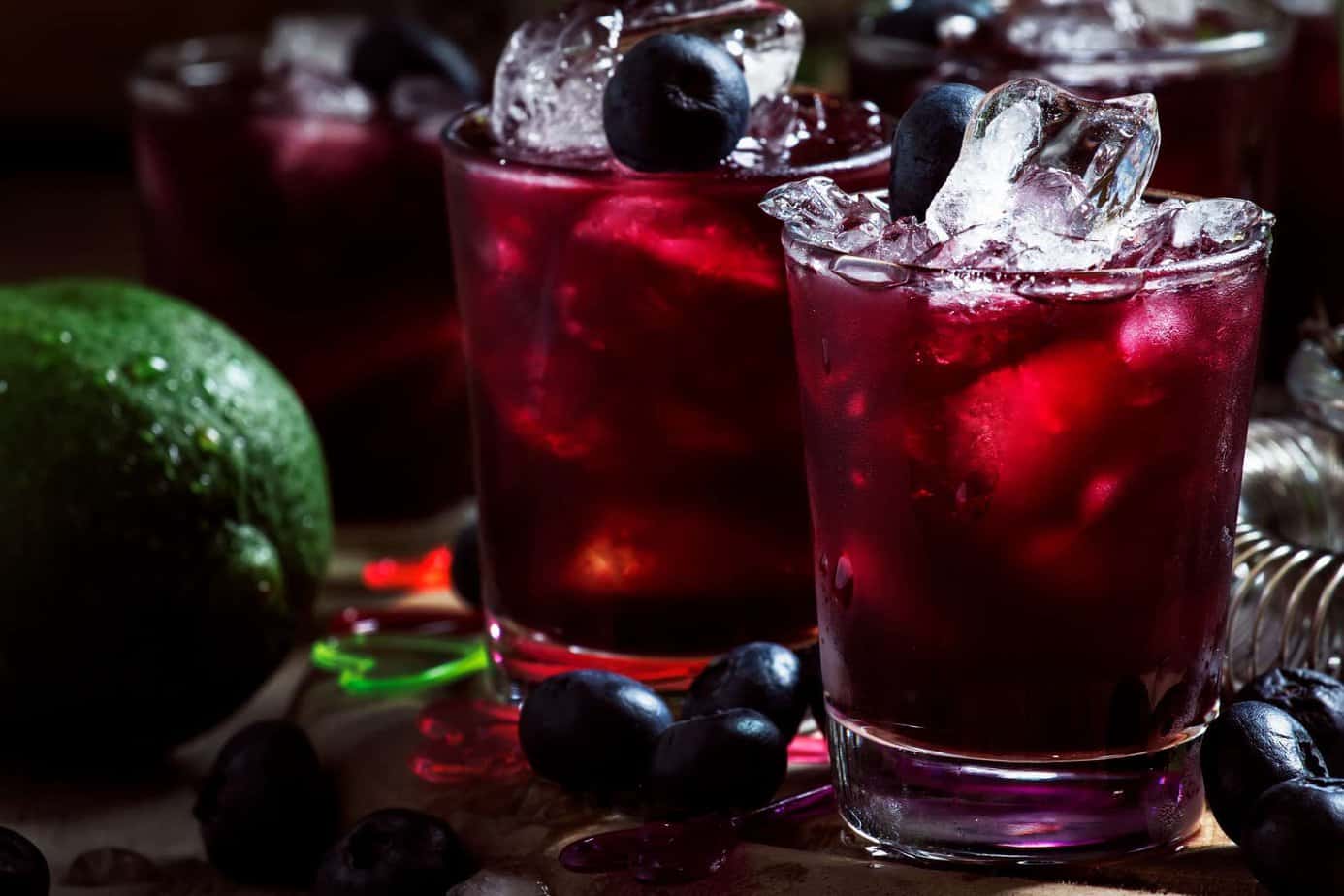 cocktails in shortball glasses decorated with blueberries in Margaret River