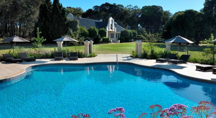 view of Cape Lodge over the swimming pool Margaret River luxury accommodation