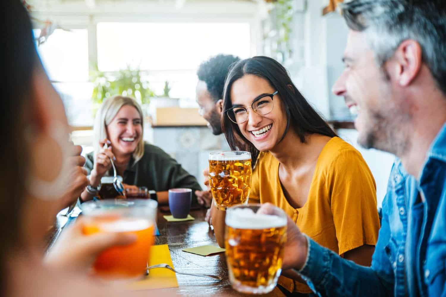People enjoy pints of beer at a margaret river brewery
