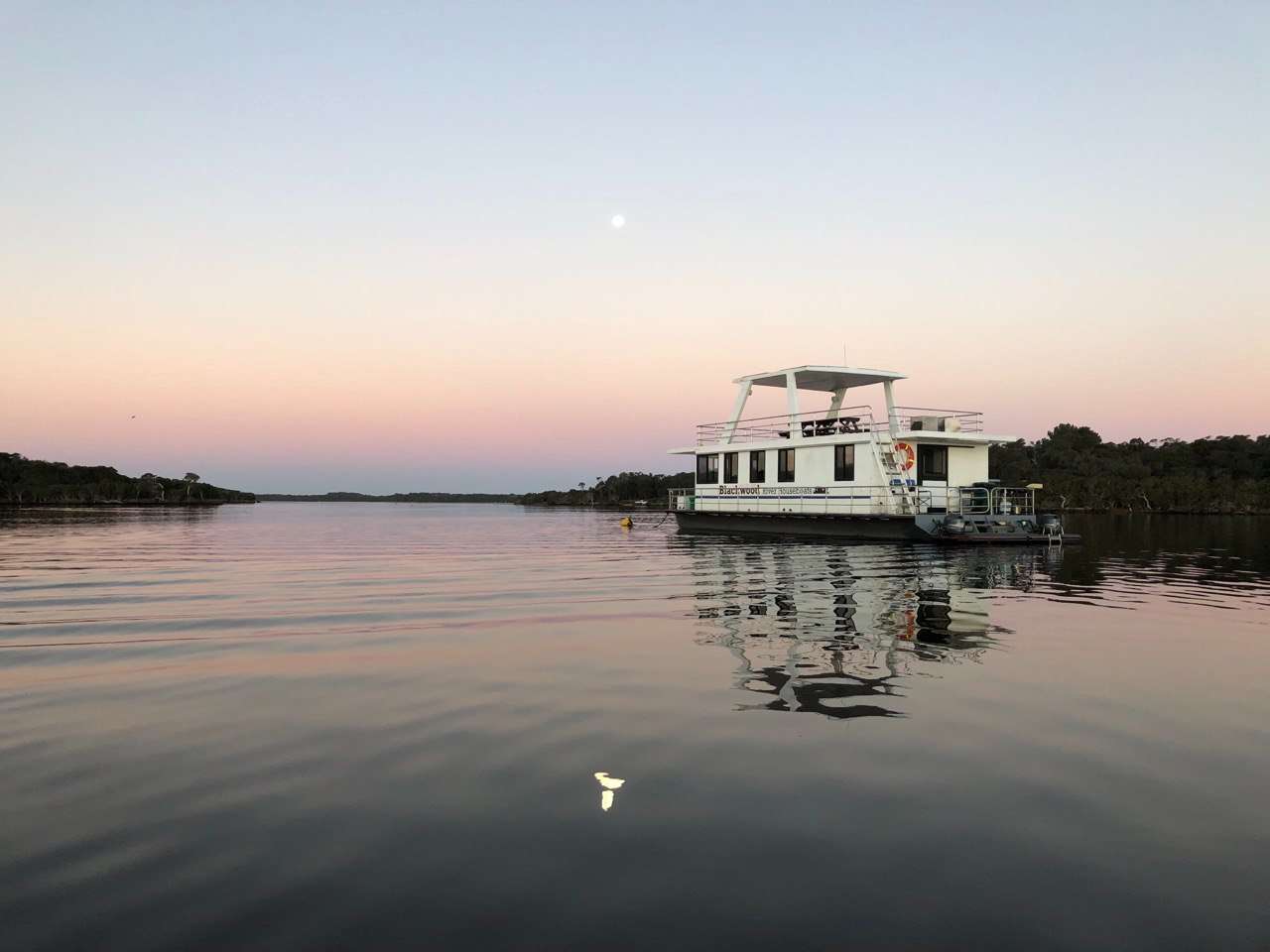 view of blackwood river houseboats on the blackwood river at sunset