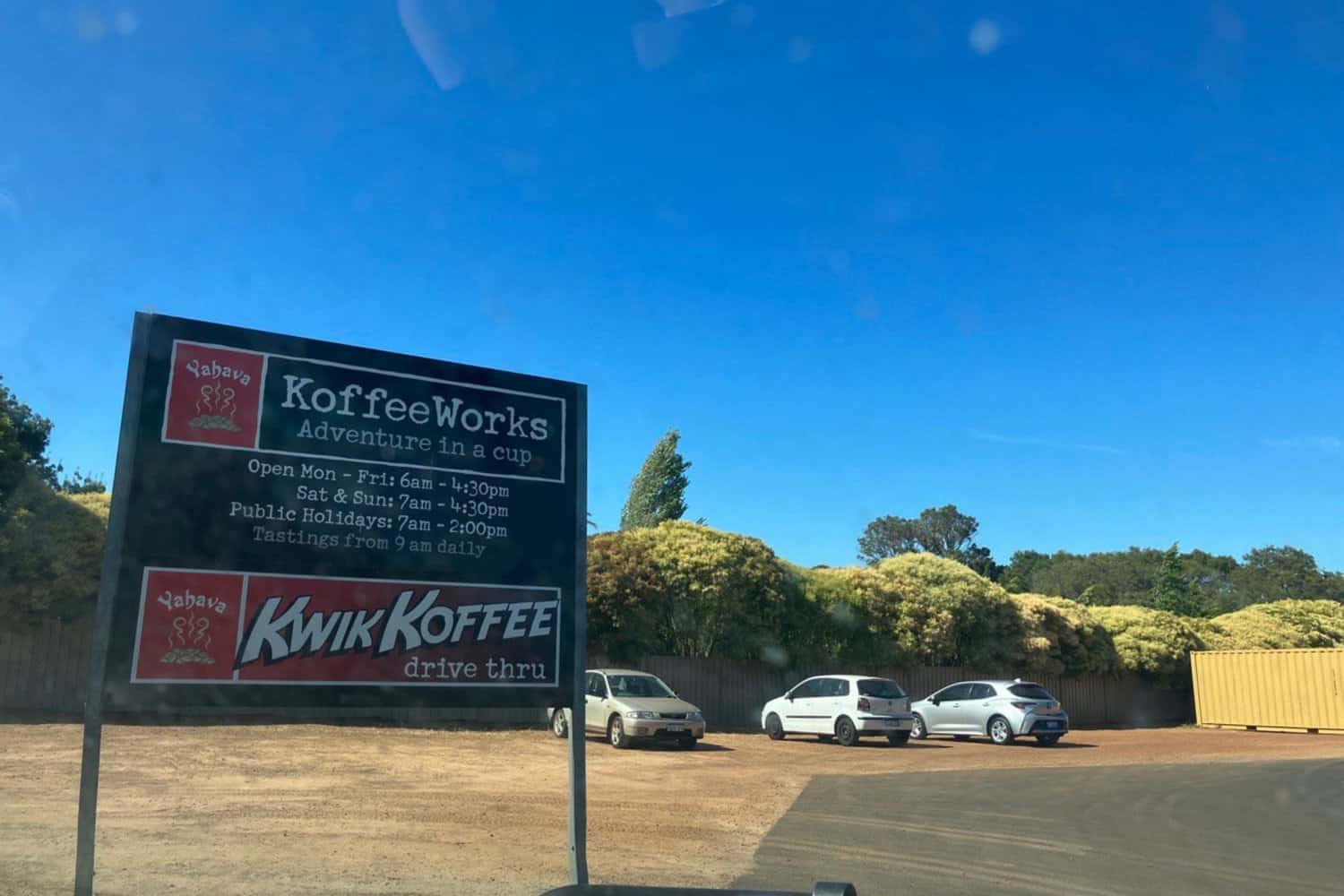Yahava KoffeeWorks sign displaying the opening hours, inviting visitors to enjoy the best coffee in Margaret River at this esteemed local establishment.